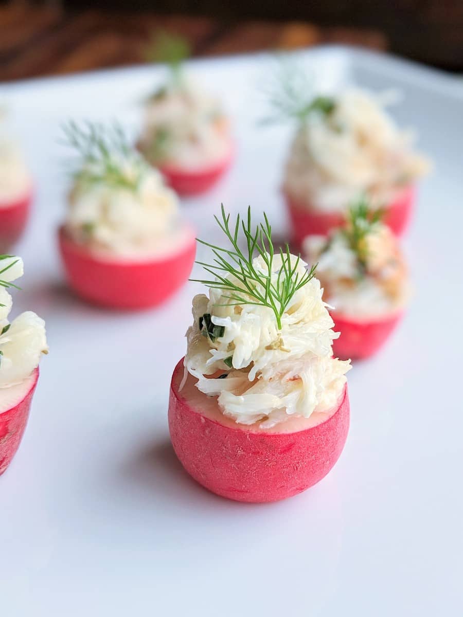 RADISH HALVES TOPPED WITH DUNGENESS CRAB SALADSea Salt and Dill copy 3